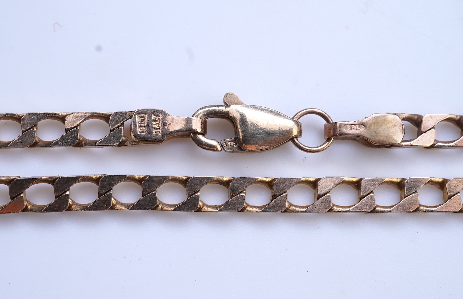 Three gold necklaces